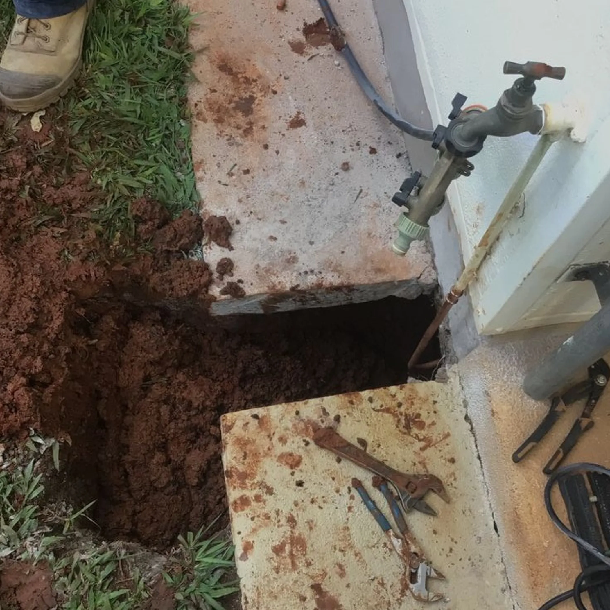 exposed plumbing excavation for leak repair